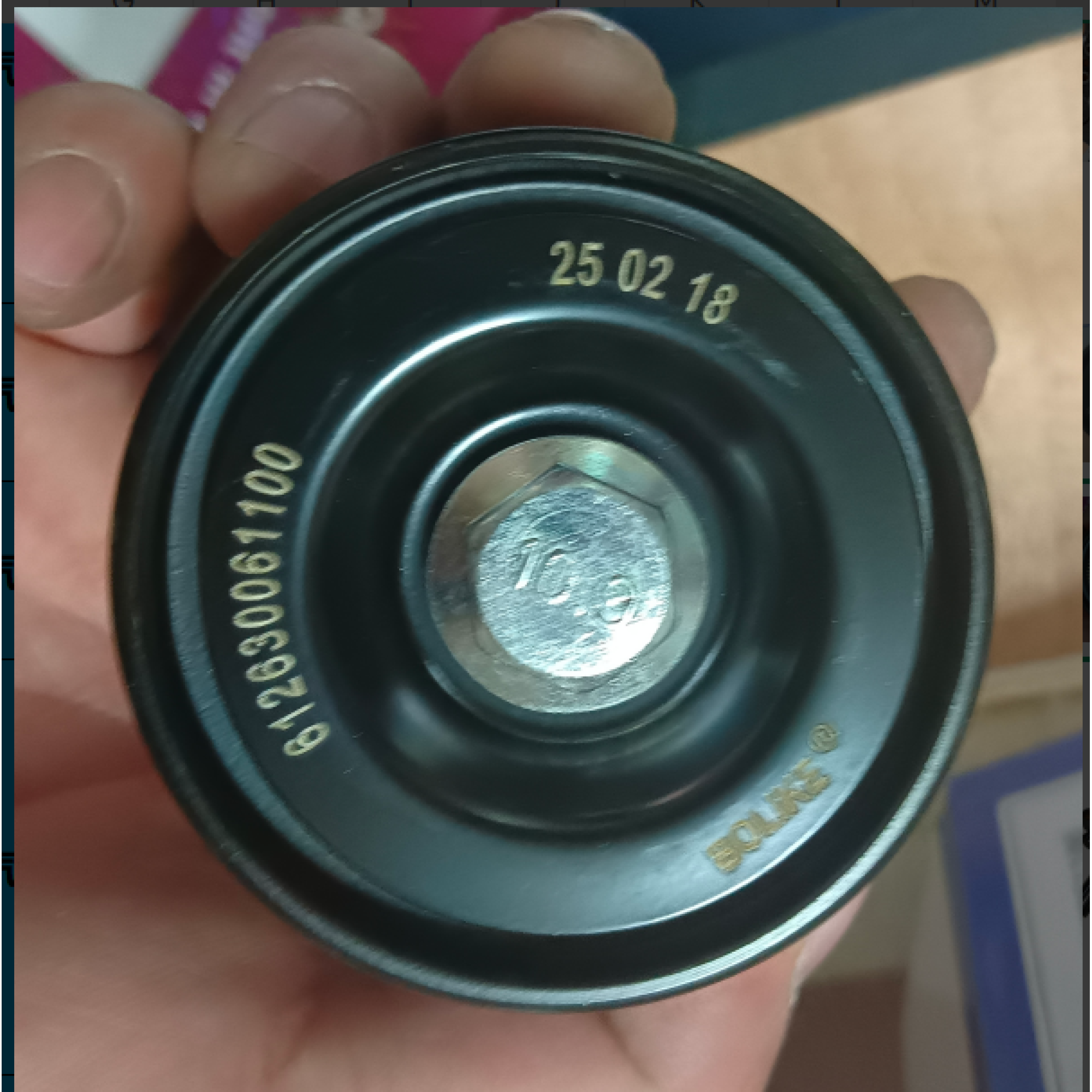 Ролик натяжителя ремня в сборе